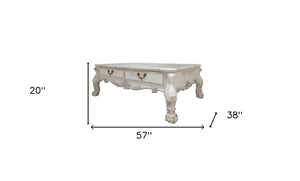 HomeRoots 57" Bone Wood Coffee Table – Elegant Carved Design with Hidden Drawers for Stylish Storage Solutions 572271