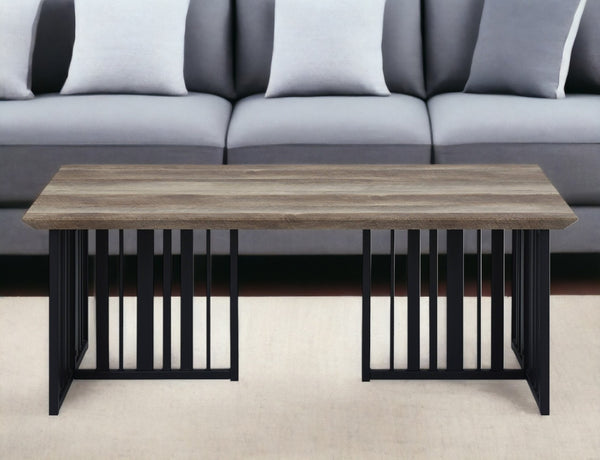 HomeRoots 47" Vintage-Industrial Oak and Black Metal Coffee Table with Distressed Finish for Living Spaces 572272