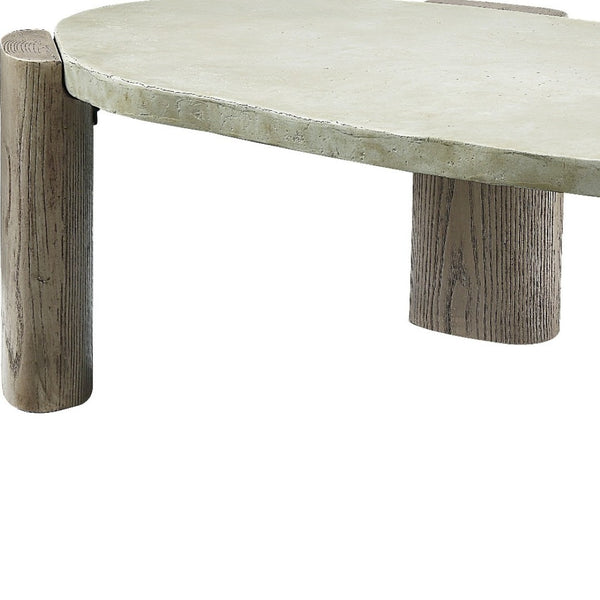 HomeRoots 47" Rustic Oval Cement Coffee Table with Distressed Beige Top & Warm Oak Legs for Modern Living Spaces 572275