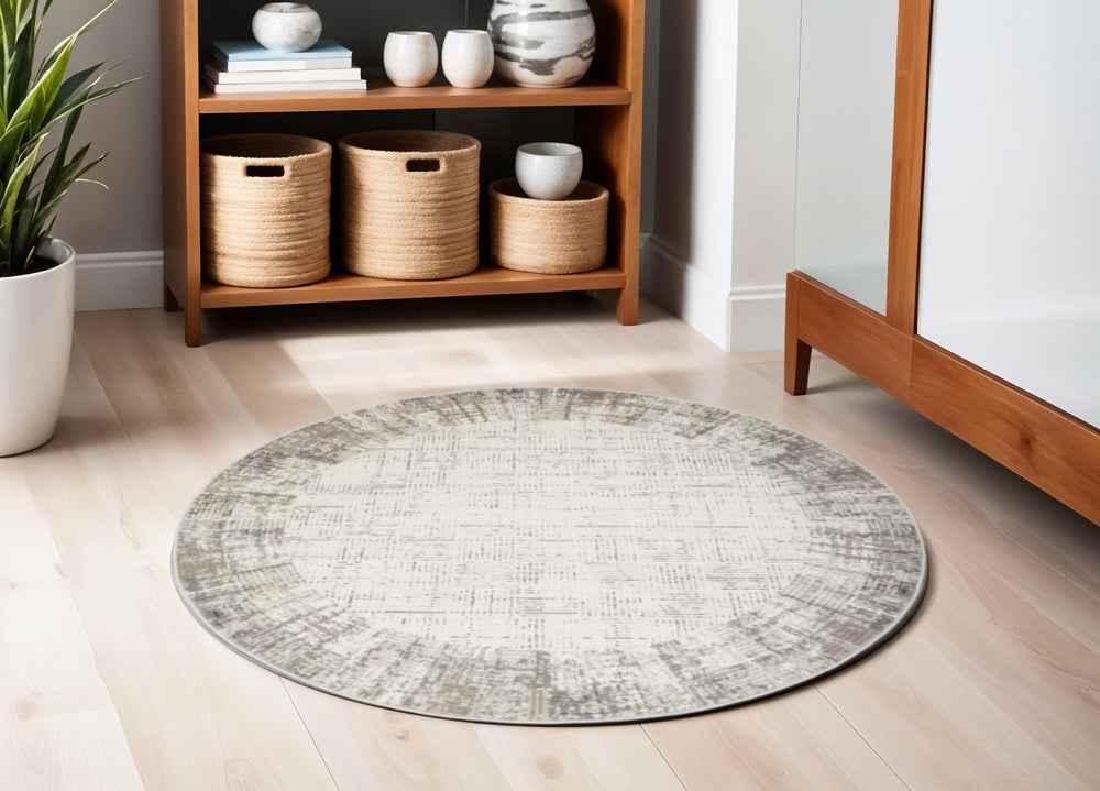 Homeroots 5' Ivory And Gray Abstract Round Rug  Polypropylene 572513