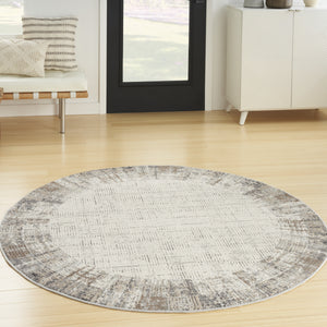 Homeroots 5' Ivory And Gray Abstract Round Rug  Polypropylene 572513