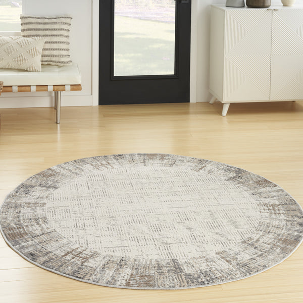 Homeroots 5' Ivory And Gray Abstract Round Rug  Polypropylene 572513