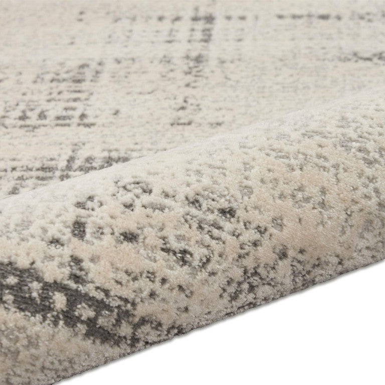 6 Foot Round Ivory Abstract Polypropylene Area Rug for Modern Living Spaces