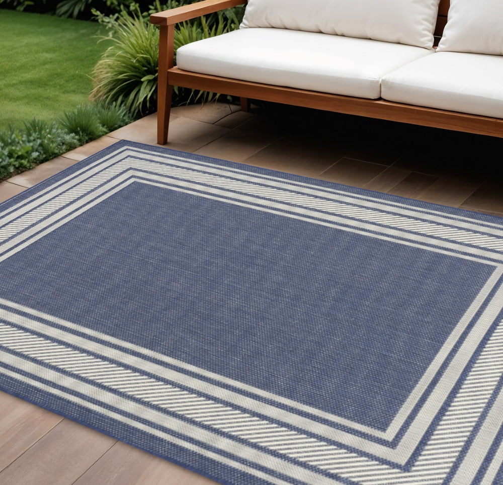 HomeRoots 6' Navy Blue & Ivory Geometric Area Rug - Durable Indoor/Outdoor Design for Modern Spaces, 6' x 9' 572870