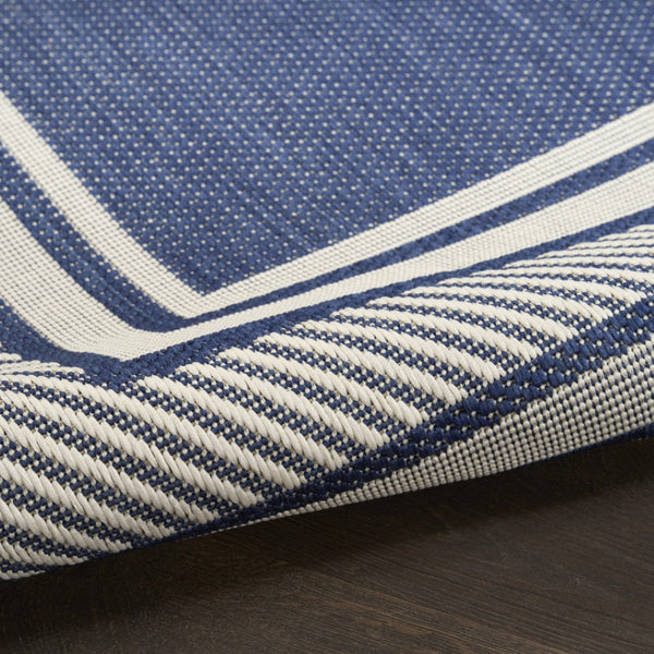 HomeRoots 6' Navy Blue & Ivory Geometric Area Rug - Durable Indoor/Outdoor Design for Modern Spaces, 6' x 9' 572870