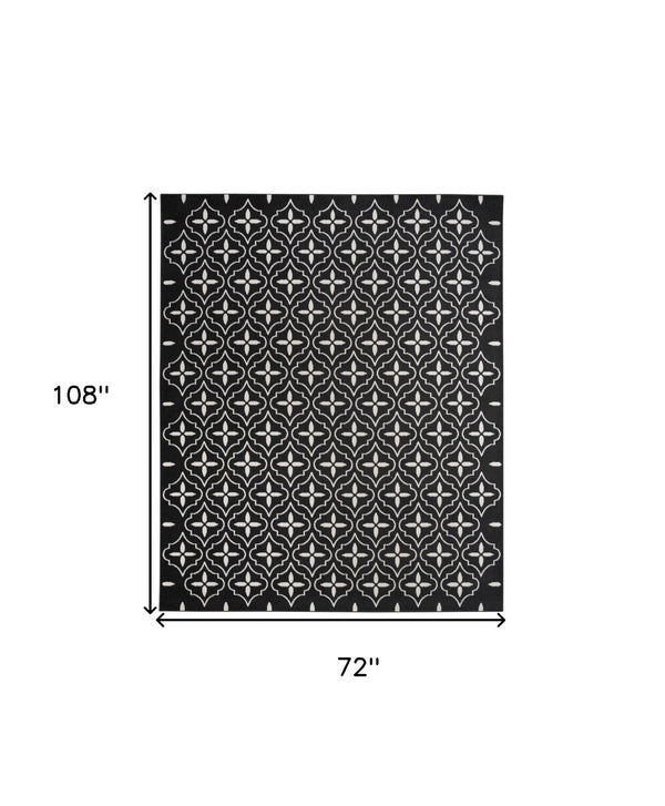 HomeRoots 6' X 9' Black and Ivory Geometric Area Rug – Stylish Indoor/Outdoor Durable Design for Modern Spaces 572904