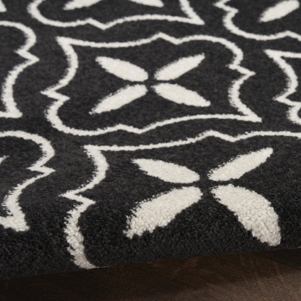 HomeRoots 6' X 9' Black and Ivory Geometric Area Rug – Stylish Indoor/Outdoor Durable Design for Modern Spaces 572904