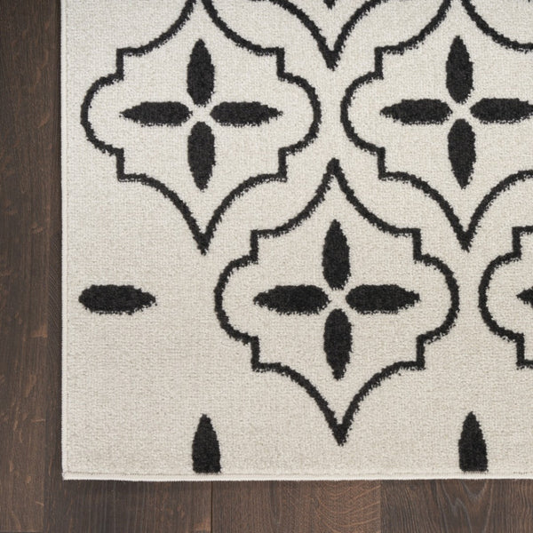 HomeRoots 6' X 9' Ivory and Black Geometric Area Rug - Durable, Stylish Indoor/Outdoor Floor Covering for Any Space 572909