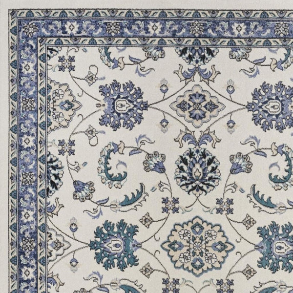 HomeRoots 7' Elegant Ivory and Blue Floral Indoor/Outdoor Area Rug - Durable, Low Maintenance, Versatile Design 573049