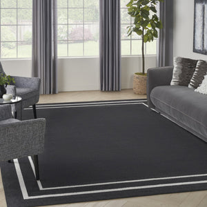 HomeRoots 7' Timeless Black and Ivory Indoor/Outdoor Area Rug - Durable, Stylish, Low-Maintenance Décor Essential 573054