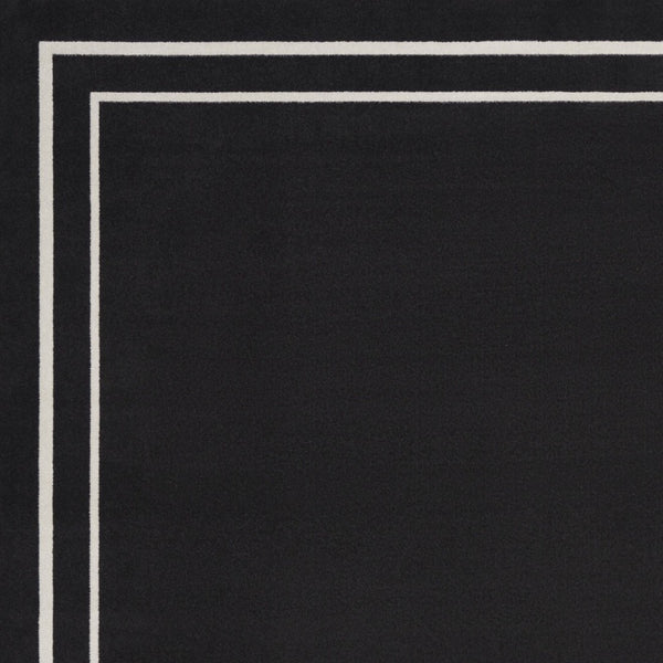 HomeRoots 7' Timeless Black and Ivory Indoor/Outdoor Area Rug - Durable, Stylish, Low-Maintenance Décor Essential 573054