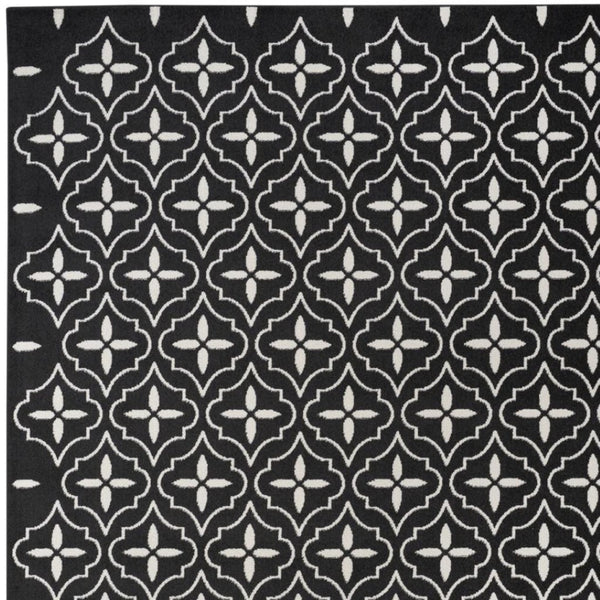 HomeRoots 8' X 10' Black And Ivory Geometric Indoor Outdoor Area Rug - Durable, Stylish, Easy to Clean Design 573064