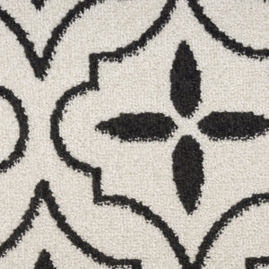 HomeRoots 8' X 10' Ivory and Black Geometric Area Rug – Stylish, Weather-Resistant for Indoor/Outdoor Spaces 573069