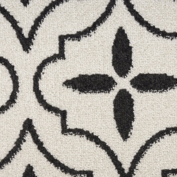 HomeRoots 8' X 10' Ivory and Black Geometric Area Rug – Stylish, Weather-Resistant for Indoor/Outdoor Spaces 573069