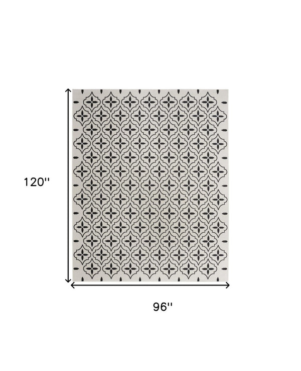 HomeRoots 8' X 10' Ivory and Black Geometric Area Rug – Stylish, Weather-Resistant for Indoor/Outdoor Spaces 573069