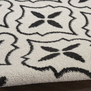 HomeRoots 8' X 10' Ivory and Black Geometric Area Rug – Stylish, Weather-Resistant for Indoor/Outdoor Spaces 573069