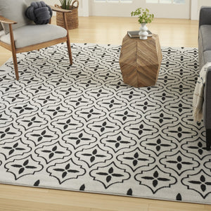 HomeRoots 8' X 10' Ivory and Black Geometric Area Rug – Stylish, Weather-Resistant for Indoor/Outdoor Spaces 573069