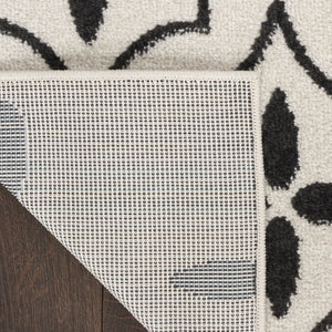 HomeRoots 8' X 10' Ivory and Black Geometric Area Rug – Stylish, Weather-Resistant for Indoor/Outdoor Spaces 573069