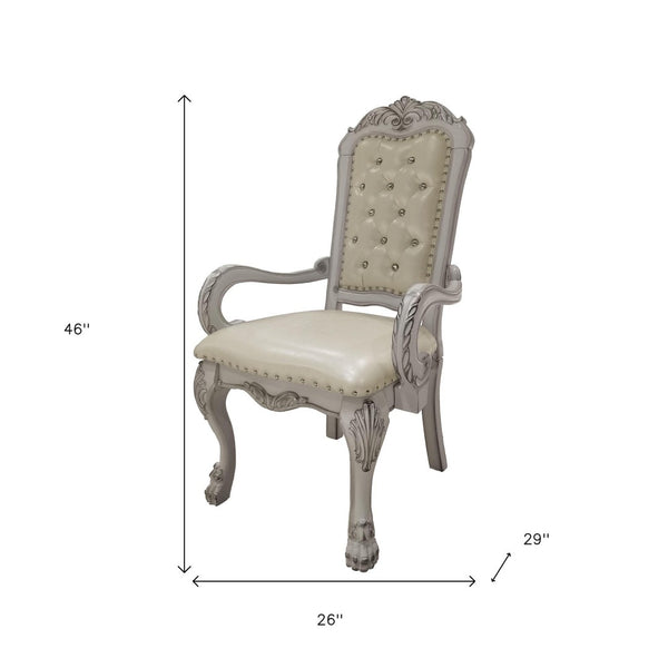 HomeRoots Set of Two Elegant Tufted White Faux Leather Dining Armchairs with Wood Legs for Versatile Use 573331