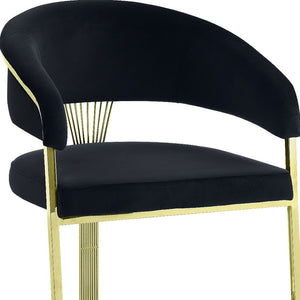 HomeRoots Black Velvet Dining Side Chair with Gold Accents - Modern Armless Design for Stylish Spaces 573338