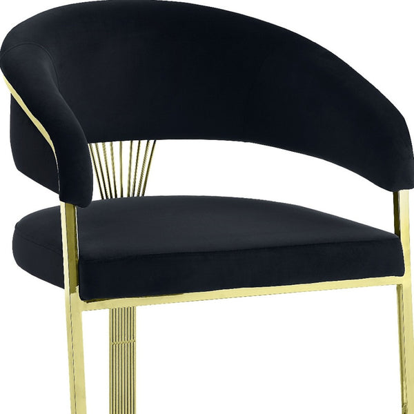 HomeRoots Black Velvet Dining Side Chair with Gold Accents - Modern Armless Design for Stylish Spaces 573338