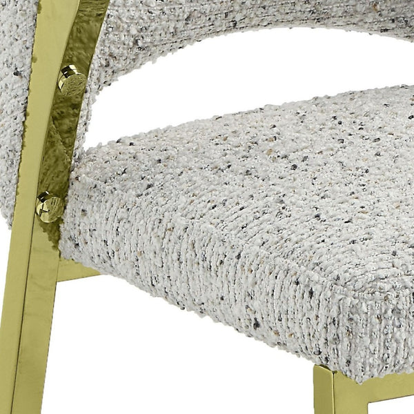 HomeRoots Beige Wing Back Dining Chair - Stylish Boucle Upholstered Accent with Gold Geometric Legs for Comfort 573341