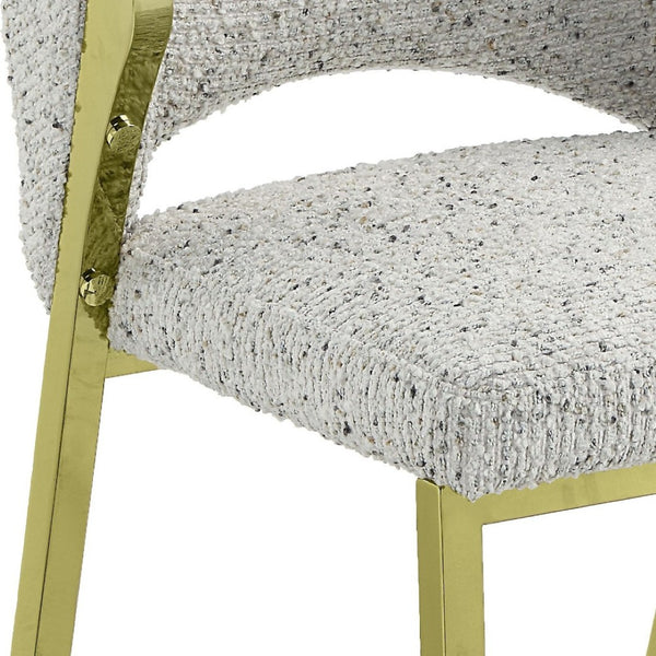 HomeRoots Beige Wing Back Dining Chair - Stylish Boucle Upholstered Accent with Gold Geometric Legs for Comfort 573341