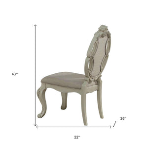 HomeRoots Set of Two Tufted Gray Fabric Side Chairs with Antiqued White Wood Legs for Versatile Elegance 573380