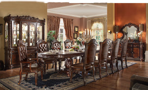 HomeRoots Set of Two Elegant Tufted Faux Leather Dining Chairs with Mahogany Legs for Modern Spaces 573386
