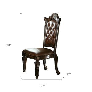 HomeRoots Set of Two Elegant Tufted Faux Leather Dining Chairs with Mahogany Legs for Modern Spaces 573386