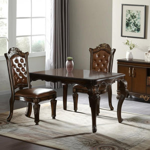 HomeRoots Set of Two Elegant Tufted Faux Leather Dining Chairs with Mahogany Legs for Modern Spaces 573386