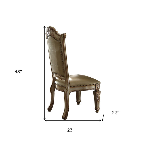 HomeRoots Set of Two Elegant Tufted Faux Leather Dining Side Chairs with Brass Accents for Modern Spaces 573393