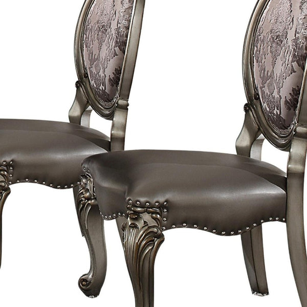 HomeRoots Set of Two King Louis High Back Side Chairs - Silver Faux Leather & Solid Wood for Elegant Spaces 573401