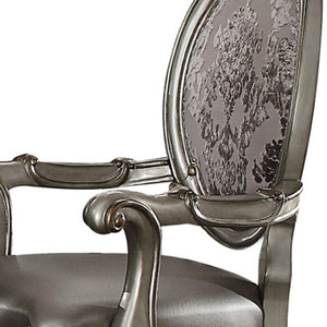 HomeRoots Set of Two Elegant Silver Faux Leather King Louis Dining Arm Chairs with Platinum Finish Legs 573402