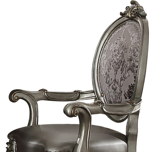 HomeRoots Set of Two Elegant Silver Faux Leather King Louis Dining Arm Chairs with Platinum Finish Legs 573402