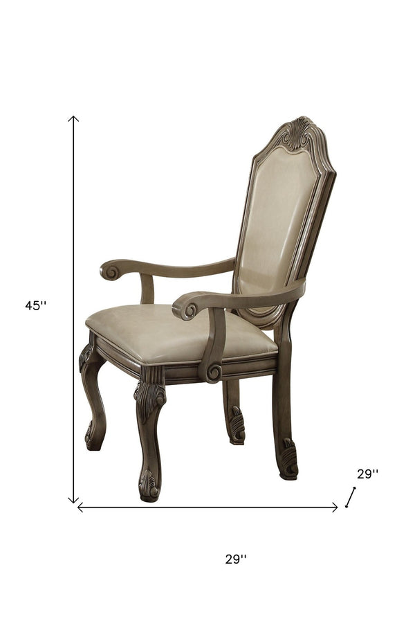 HomeRoots Set of Two Elegant Antiqued White Upholstered Faux Leather Dining Arm Chairs for Versatile Use 573413