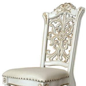 HomeRoots Set of Two Elegant Dark Blue Faux Leather Dining Chairs with Pearl Legs & Nailhead Trim Design 573417