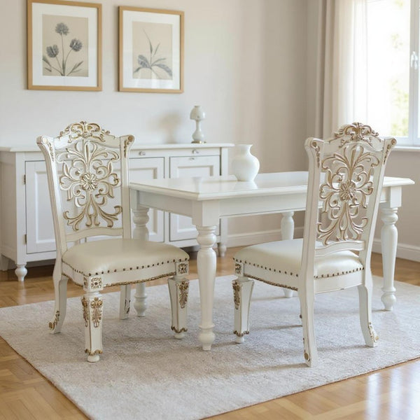 HomeRoots Set of Two Elegant Dark Blue Faux Leather Dining Chairs with Pearl Legs & Nailhead Trim Design 573417