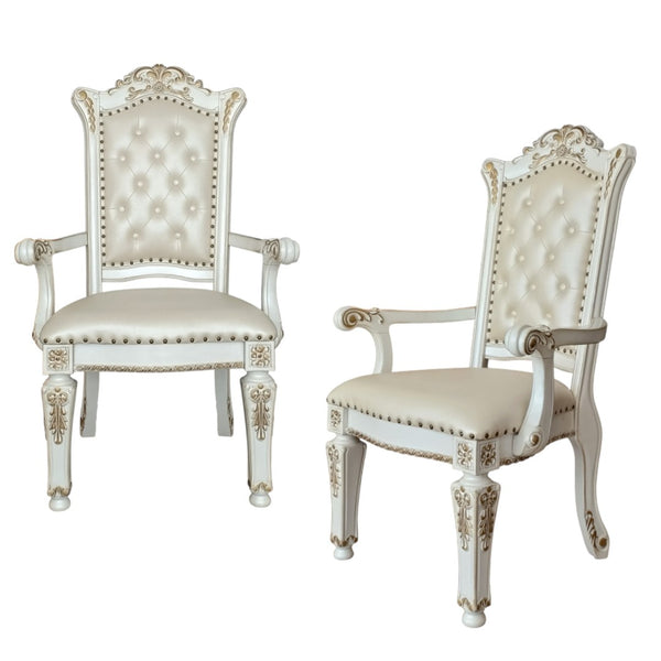 HomeRoots Set of Two Elegant Tufted Dark Blue Faux Leather Dining Arm Chairs with Pearl Legs for Comfort 573418