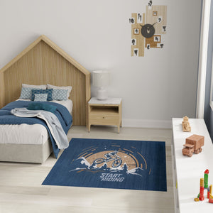 HomeRoots 5' Mountain Biker Area Rug – Vibrant Blue, Gold & White Design for Kids' Rooms, Easy Care & Durable 5' X 7' 573682