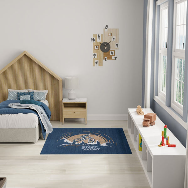 HomeRoots 5' Mountain Biker Area Rug – Vibrant Blue, Gold & White Design for Kids' Rooms, Easy Care & Durable 5' X 7' 573682