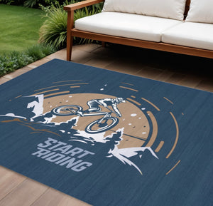 HomeRoots 5' Mountain Biker Area Rug – Vibrant Blue, Gold & White Design for Kids' Rooms, Easy Care & Durable 7' X 9' 573709