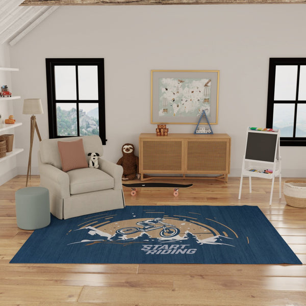 HomeRoots 5' Mountain Biker Area Rug – Vibrant Blue, Gold & White Design for Kids' Rooms, Easy Care & Durable 7' X 9' 573709