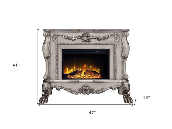 HomeRoots 47" Bone Wood Electric Fireplace with Mantle - Ornate Carved Scrollwork, Realistic Flames & Remote Control 574008