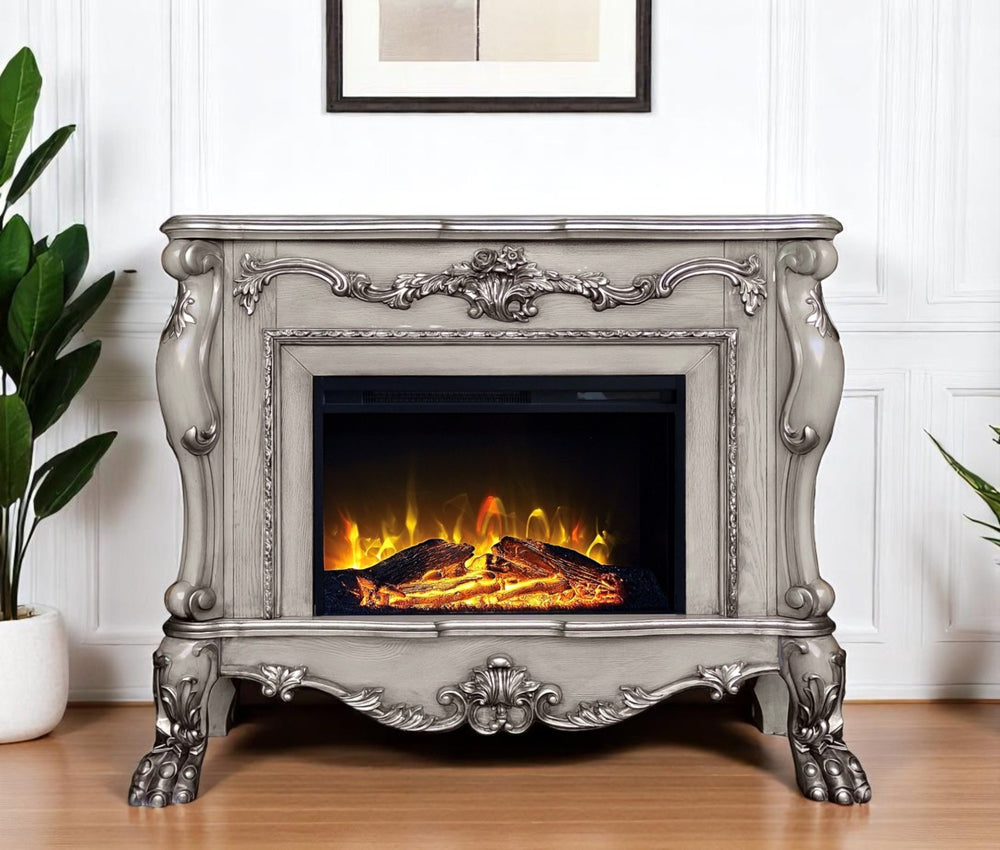 HomeRoots 47" Bone Wood Electric Fireplace with Mantle - Ornate Carved Scrollwork, Realistic Flames & Remote Control 574008