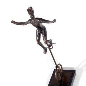 HomeRoots 16" Bronze Resin Unicycle Man Sculpture - Whimsical Art for Stylish Tabletop Décor & Gift Ideas 574103
