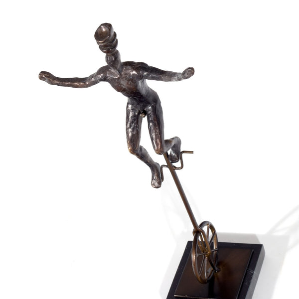 HomeRoots 16" Bronze Resin Unicycle Man Sculpture - Whimsical Art for Stylish Tabletop Décor & Gift Ideas 574103