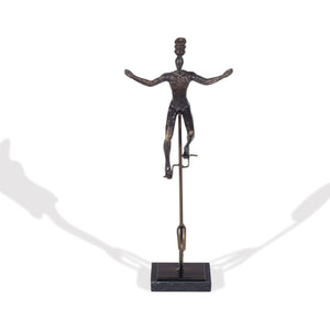 HomeRoots 16" Bronze Resin Unicycle Man Sculpture - Whimsical Art for Stylish Tabletop Décor & Gift Ideas 574103