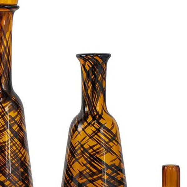 HomeRoots Set of Three Amber Swirl Glass Bottles with Stoppers – Stylish Decor for Any Space, Gift-Ready! 574229