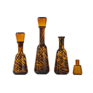 HomeRoots Set of Three Amber Swirl Glass Bottles with Stoppers – Stylish Decor for Any Space, Gift-Ready! 574229